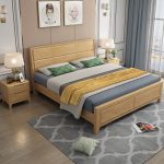 Sleek modern lines define the minimalist style of this rubberwood bed.
