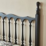 The vintage rubberwood bed combines classic elegance with sturdy craftsmanship.