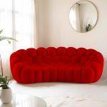 A playful bubble football-inspired cream sofa combining inflatable aesthetics with modular lounge functionality, crafted from tear-resistant TPU and eco-friendly memory foam for dynamic living spaces.