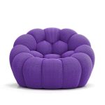 A playful bubble football-inspired cream sofa combining inflatable aesthetics with modular lounge functionality, crafted from tear-resistant TPU and eco-friendly memory foam for dynamic living spaces.