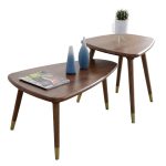 Marble and oak Scandinavian luxury coffee table with metallic accents for chic elegance.