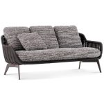 Relax outdoors with a cozy and chic sofa.