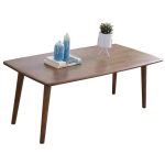 Scandinavian coffee table combines minimalist design with natural wood for versatile elegance.