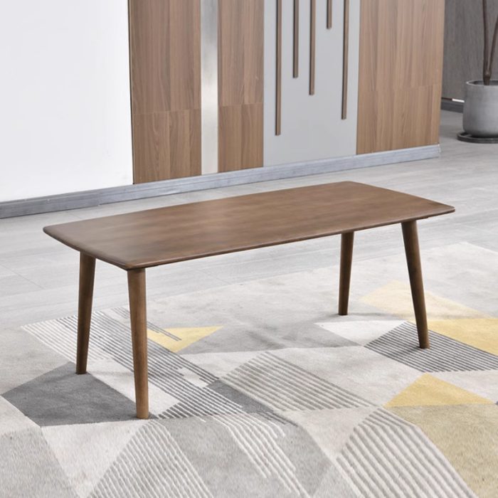 Scandinavian coffee table combines minimalist design with natural wood for versatile elegance.
