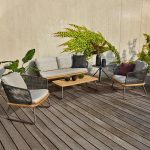 Enjoy nature with a chic outdoor sofa.