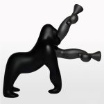 A sculptural gorilla-shaped floor lamp merging artistic expression with functional lighting, crafted from industrial-grade metal and adjustable LED panels for modern interiors.