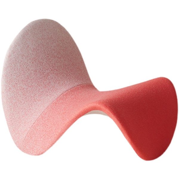 Instagram-famous tongue-shaped chair merges ergonomic curves with vegan leather comfort, becoming a provocative yet functional art piece for trendy spaces.