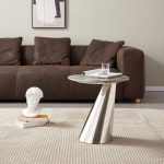 Stainless steel side table base with a unique geometric design