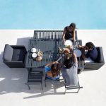Unwind in luxury with a sophisticated outdoor sofa.