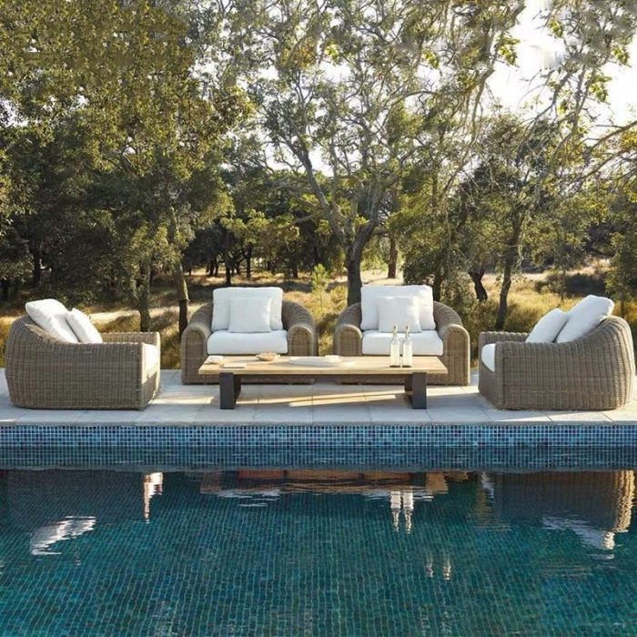 Delight in leisure with a comfortable outdoor sofa.