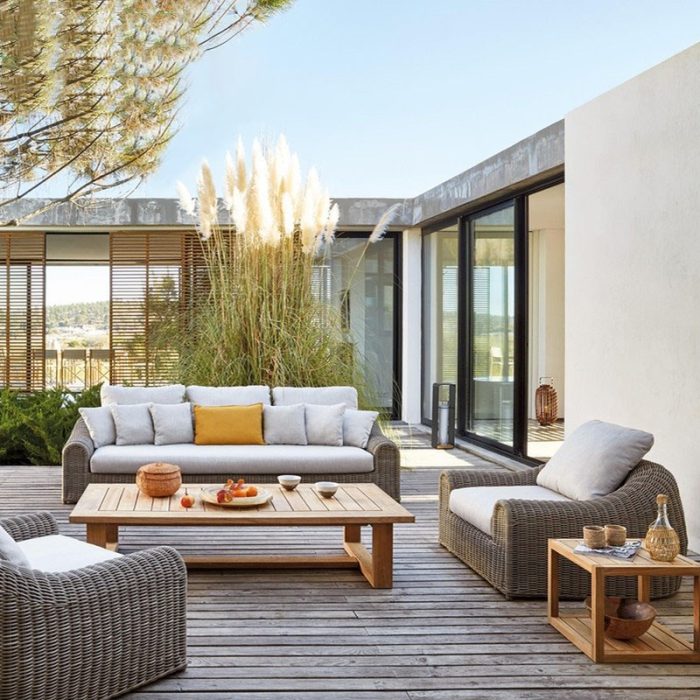 Delight in leisure with a comfortable outdoor sofa.