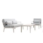 Relax outdoors with a cozy and chic sofa.