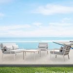 Relax outdoors with a cozy and chic sofa.