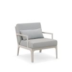 Relax outdoors with a cozy and chic sofa.