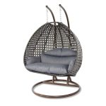 Enjoy nature in comfort with a hanging wicker chair.