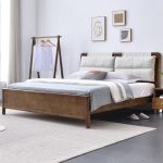 This Nordic wooden bed features clean lines and natural elegance.