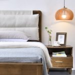 This Nordic wooden bed features clean lines and natural elegance.