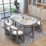 Scandinavian Marble Dining Table with Wooden Legs and Cushioned Dining Chairs