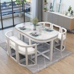 Scandinavian Marble Dining Table with Wooden Legs and Cushioned Dining Chairs