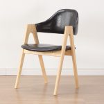 Nordic solid wood leisure chair that offers comfort and style.