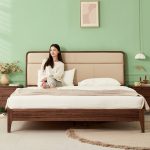 This Nordic wooden bed features clean lines and natural elegance.