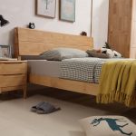 The Nordic wooden bed embodies simple elegance and functionality.