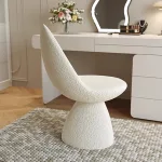 Experience plush comfort with our solid wood vanity stool.