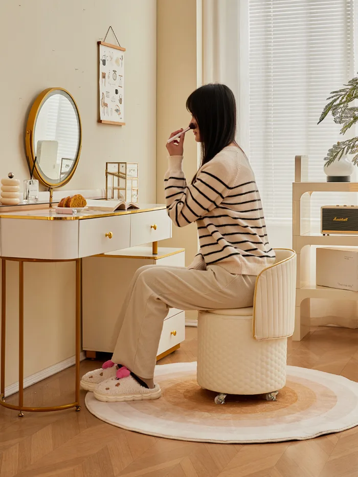 Chic vanity stool with solid wooden frame and soft sponge seat.