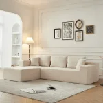 The Nordic-style cushioned sofa embodies simplicity, functionality, and elegance.