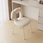 Chic vanity stool with solid wooden frame and soft sponge seat.