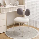 Solid wood vanity stool with plush sponge cushion for added comfort.
