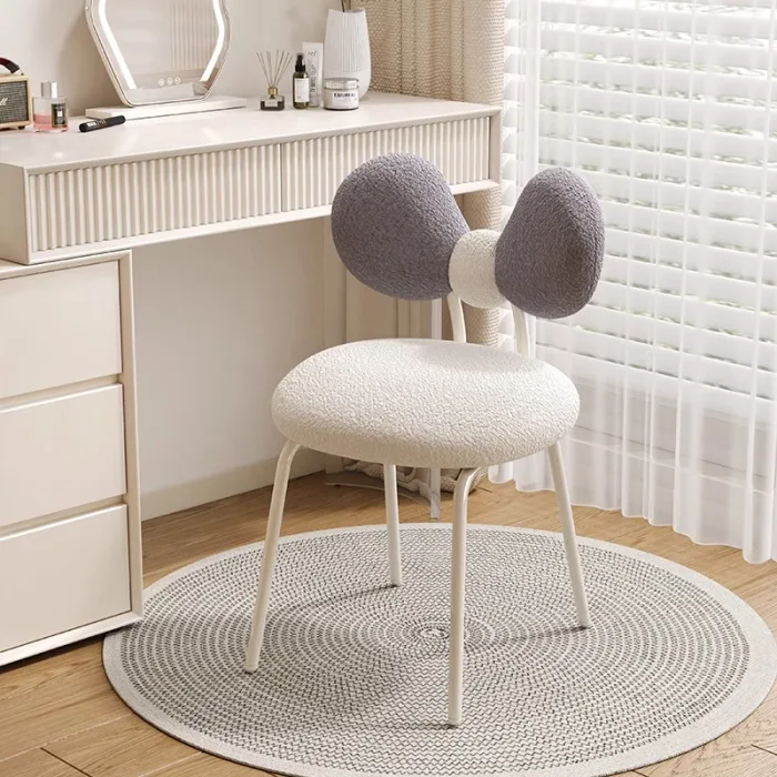 Solid wood vanity stool with plush sponge cushion for added comfort.