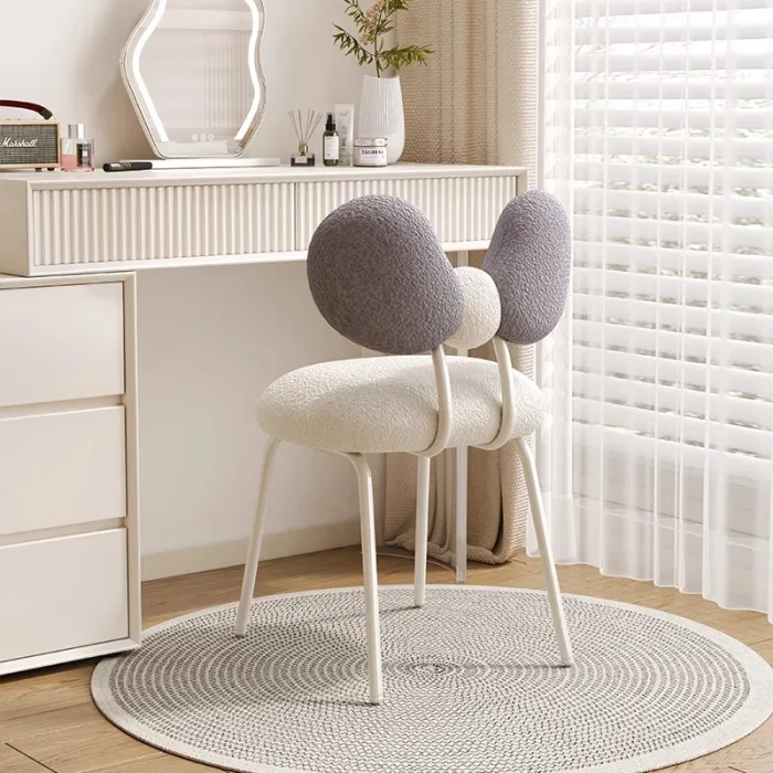Solid wood vanity stool with plush sponge cushion for added comfort.