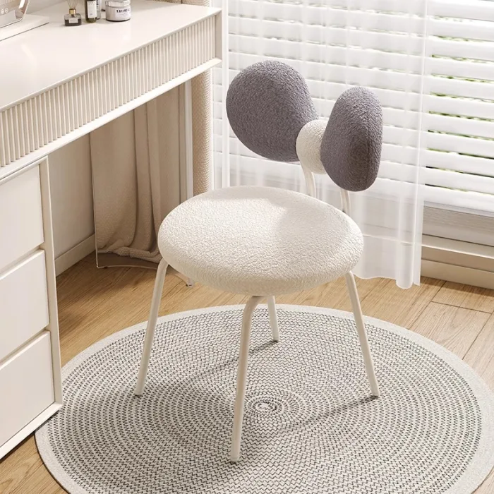 Solid wood vanity stool with plush sponge cushion for added comfort.