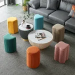 Vanity stool with robust wood frame and cozy sponge seating.