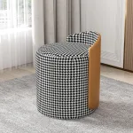 Vanity stool with solid wood frame and plush sponge cushion.