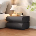 A sleek and modern bedside table that complements any bedroom decor.